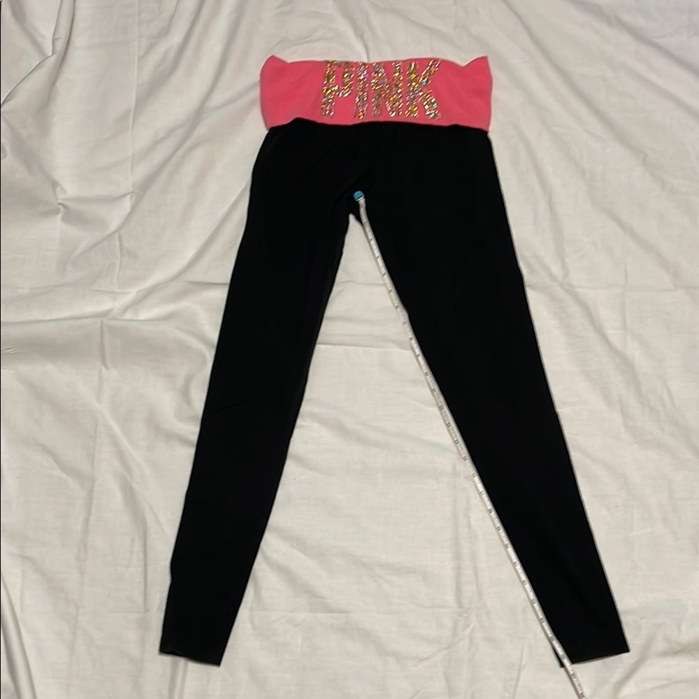 PINK fold over yoga pants with gem embossed pink on waistband. Sz. XS. Good cond